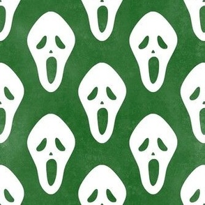 Medium Scale White Halloween Scream Face Masks on Green