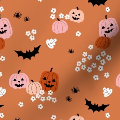 Happy halloween pumpkins bats and spiders with boho blossom vintage daisies orange blush on papaya