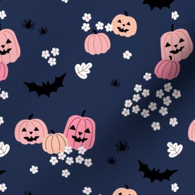 Happy halloween pumpkins bats and spiders with boho blossom vintage daisies pink blush on navy blue