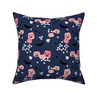 Happy halloween pumpkins bats and spiders with boho blossom vintage daisies pink blush on navy blue