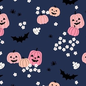 Happy halloween pumpkins bats and spiders with boho blossom vintage daisies pink blush on navy blue