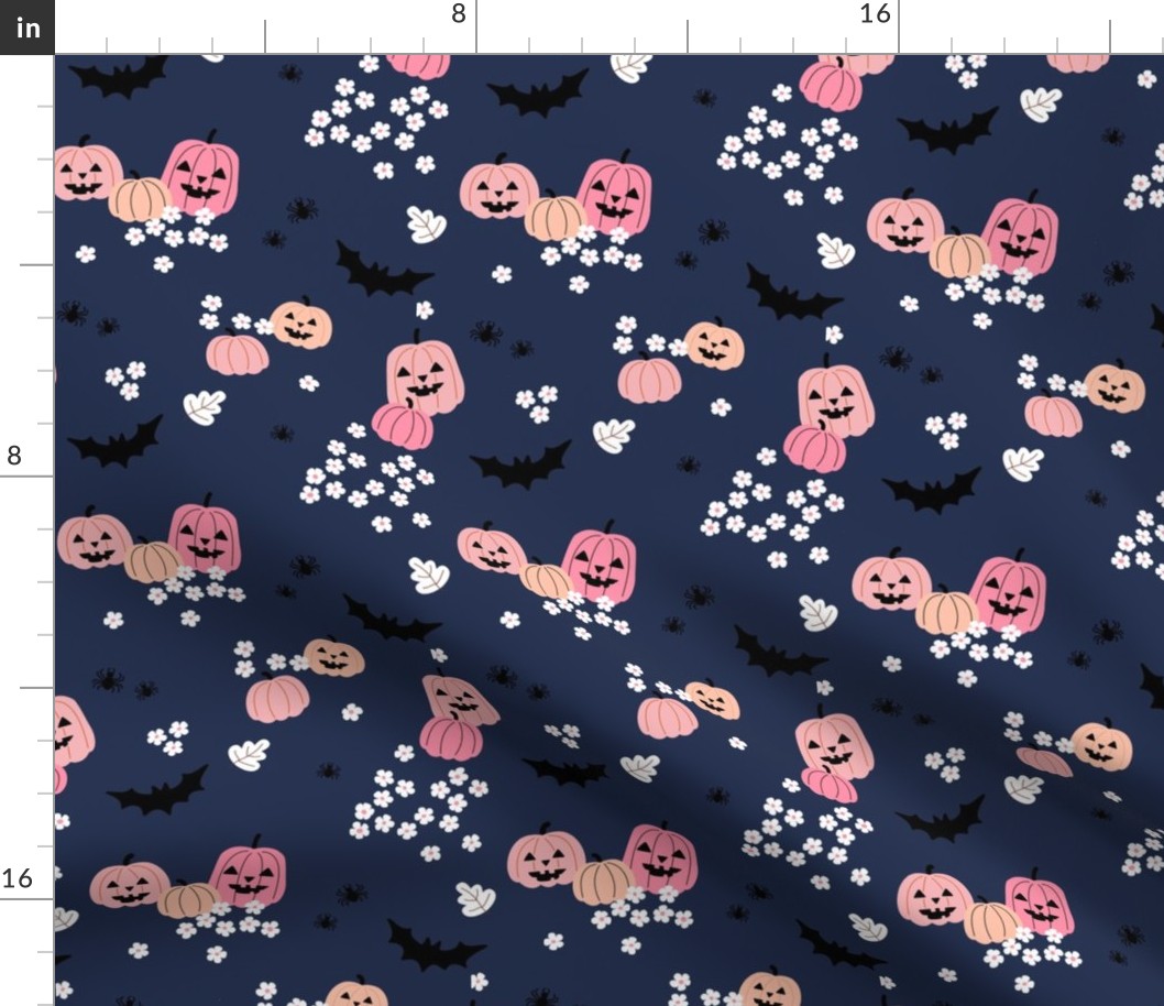 Happy halloween pumpkins bats and spiders with boho blossom vintage daisies pink blush on navy blue