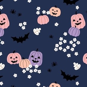 Happy halloween pumpkins bats and spiders with boho blossom vintage daisies lilac blush on navy blue