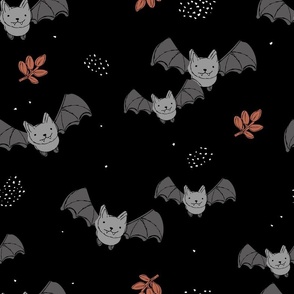 Adorable baby bats for autumn halloween design freehand drawn gray rust on black  