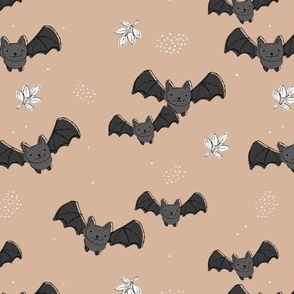 Adorable baby bats for autumn halloween design freehand drawn gray rust on tan beige