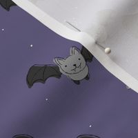 Adorable baby bats for autumn halloween design freehand drawn gray rust on purple