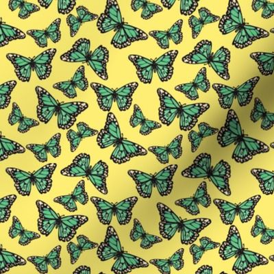 Green Butterflies on Yellow