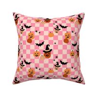 Halloween pumpkins and witches hats bats and spiders on classic checkerboard pink blush orange