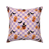 Halloween pumpkins and witches hats bats and spiders on classic checkerboard lilac blush orange peach
