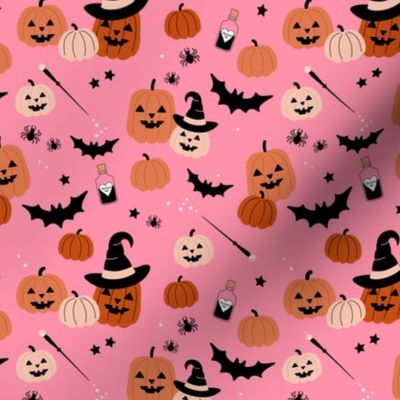 Magic pumpkin patch witches magic wand and creepy animals bats and spiders on bubblegum pink