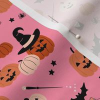 Magic pumpkin patch witches magic wand and creepy animals bats and spiders on bubblegum pink