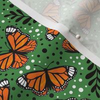Medium Scale Orange Monarch Butterflies on Kelley Green