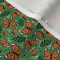 Small Scale Orange Monarch Butterflies on Kelley Green
