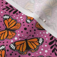 Medium Scale Orange Monarch Butterflies on Peony Pink