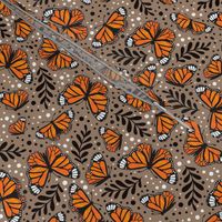 Medium Scale Orange Monarch Butterflies on Mushroom Brown Tan