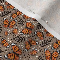 Small Scale Orange Monarch Butterflies on Mushroom Brown Tan