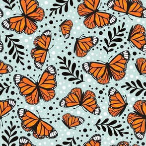 Large Scale Orange Monarch Butterflies on Pale Seaglass Aqua