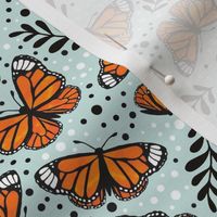Medium Scale Orange Monarch Butterflies on Pale Seaglass Aqua
