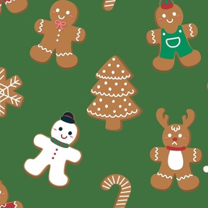 Christmas Gingerbread Biscuit Cookies on Christmas Tree Green
