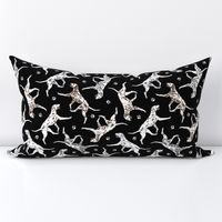 Trotting Dalmatians and paw prints - black