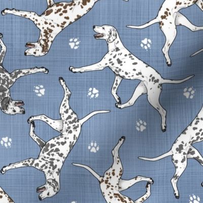 Trotting Dalmatians and paw prints - faux denim