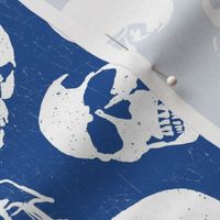 Spooky Skulls, White on Blue by Brittanylane