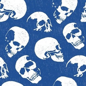 Spooky Skulls, White on Blue by Brittanylane