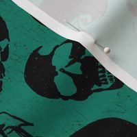 Spooky Skulls, Black on Green by Brittanylane