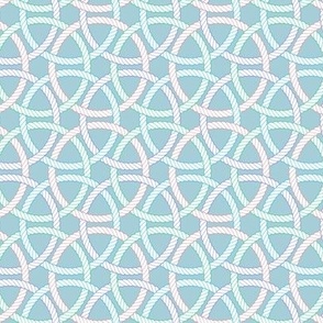 interlocking rope rings in pastels on light blue