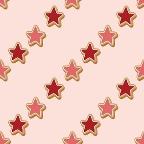 Medium Diagonal Christmas Diagonal Gingerbread Red and Pink Star Cookies with Pale Pink  Background