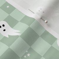 Spooky halloween ghosts and stars on checkerboard adorable kawaii baby nineties trend nursery design sage green mint