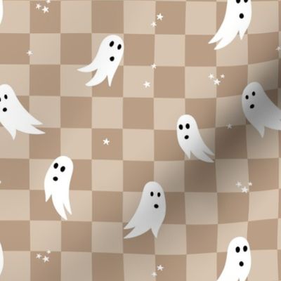 Spooky halloween ghosts and stars on checkerboard adorable kawaii baby nineties trend nursery design beige tan