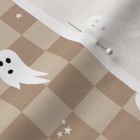 Spooky halloween ghosts and stars on checkerboard adorable kawaii baby nineties trend nursery design beige tan