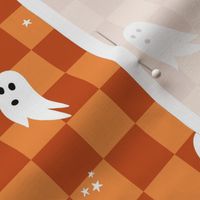 Spooky halloween ghosts and stars on checkerboard adorable kawaii baby nineties trend nursery design orange rust