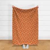 Spooky halloween ghosts and stars on checkerboard adorable kawaii baby nineties trend nursery design orange rust