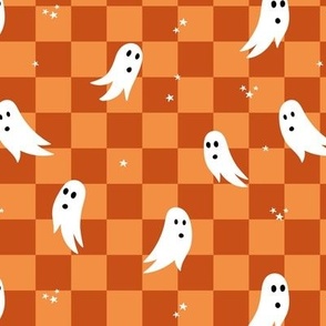 Spooky halloween ghosts and stars on checkerboard adorable kawaii baby nineties trend nursery design orange rust