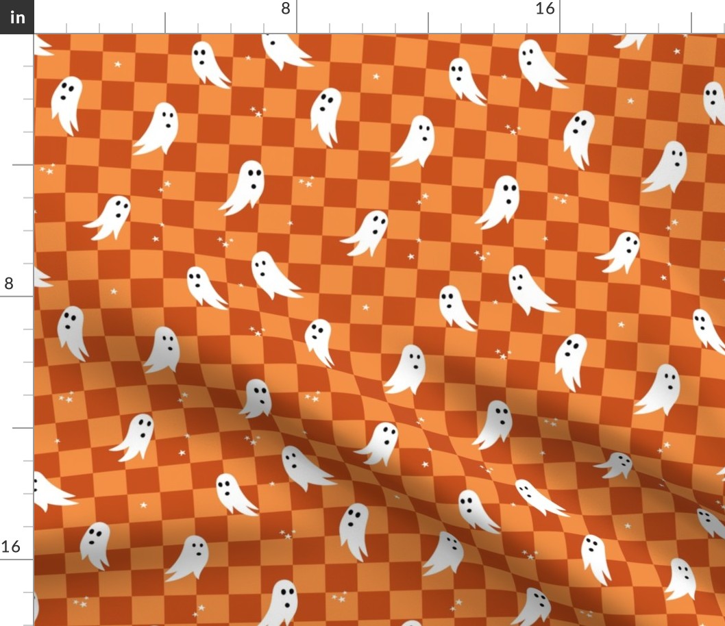 Spooky halloween ghosts and stars on checkerboard adorable kawaii baby nineties trend nursery design orange rust