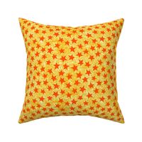 batik stars - orange on gold/white