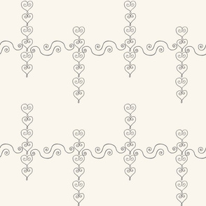 wire hearts and flourishes on cream