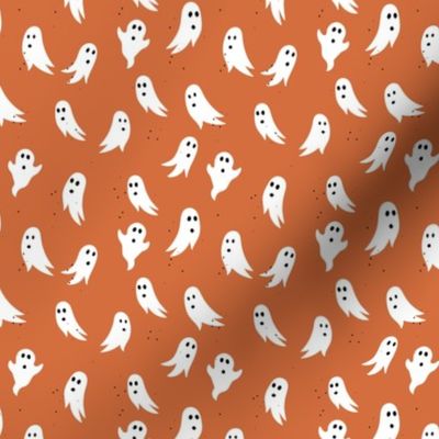 Spooky ghosts boho fright night minimalist halloween design on burnt orange 