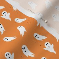 Spooky ghosts boho fright night minimalist halloween design on tangerine orange 