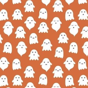 Spooky cute ghosts kawaii fright night minimalist halloween design on burnt orange rust