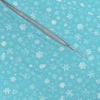 photographic snowflakes on pale cyan (medium snowflakes)
