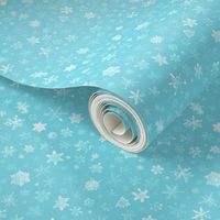 photographic snowflakes on pale cyan (medium snowflakes)