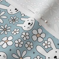 Cute spring blossom floral bunnies cutesie kids design with daisies and bunny on moody blue