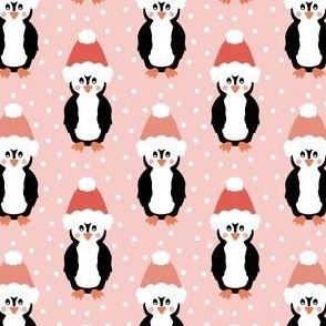 Jolly Christmas penguins in Santa hats on pink