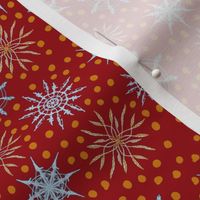 Handdrawn winter snowflakes and spots on crimson red small