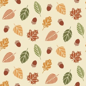 Green, orange, yellow, red and brown autumn leaves and acorns on cream background (small)
