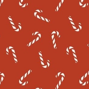 Simple Christmas candy canes on red