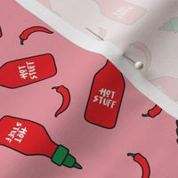 (S Scale) Hot Stuff | Hot Sauce Bottle with Peppers Scattered on Pink